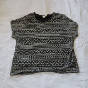 Black and white zig zag pattern light top